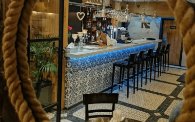 Caravela's marble bar, blue Portuguese tiles and patterned floor